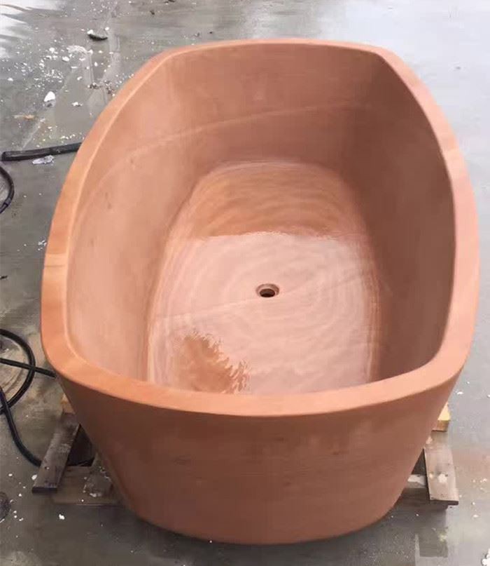 Red sandstone bathtub for interior